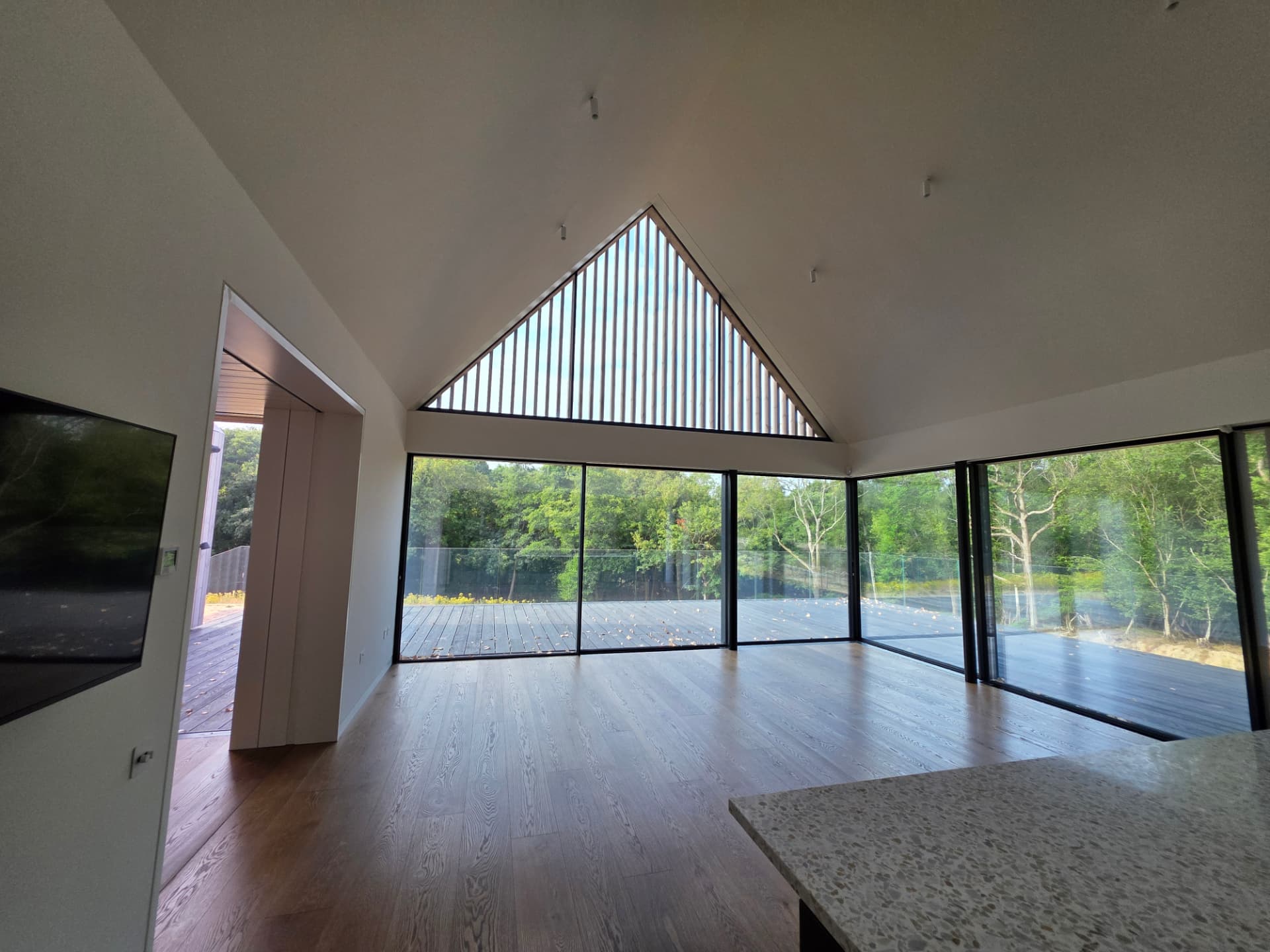 Vaulted living space ventilated by a whole-house MVHR system